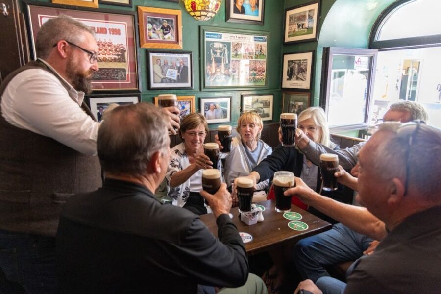 Galway: Food and Culture Walking Tour with Tastings - Medieval walls, landmarks, and street performers
