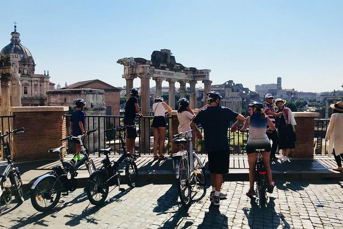 Gems of Rome: Small Group E-Bike Tour with Street Food stops - What the guide adds to the ride
