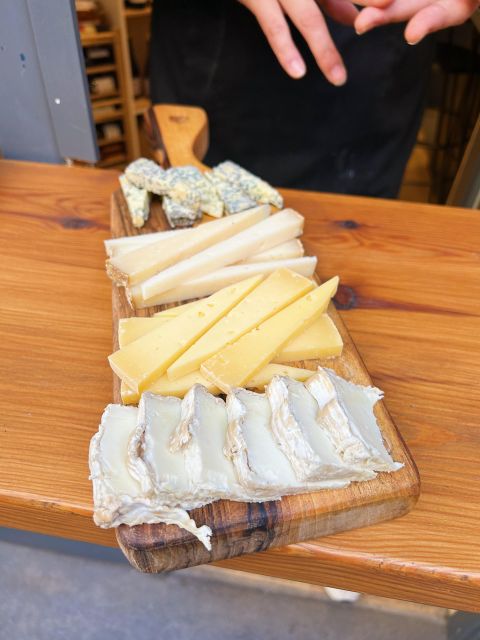 Girona Evening Food Tour & Tapas Bar Experience - The central squares keep the walk moving