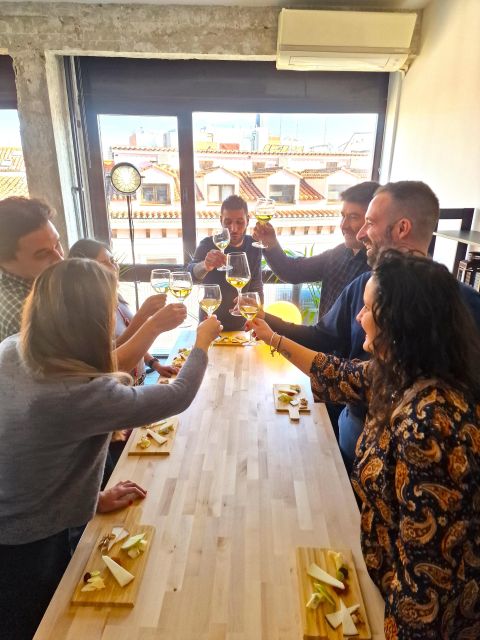 Gourmet Experience: Tasting of Spanish Cheeses and Wines - A cheese table with a map of Spain