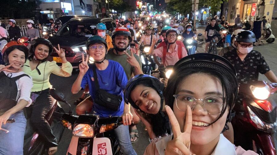 Ho Chi Minh City: Food Tour by Scooter with Eleven Tastings - First bites: banana sticky rice and bánh xèo