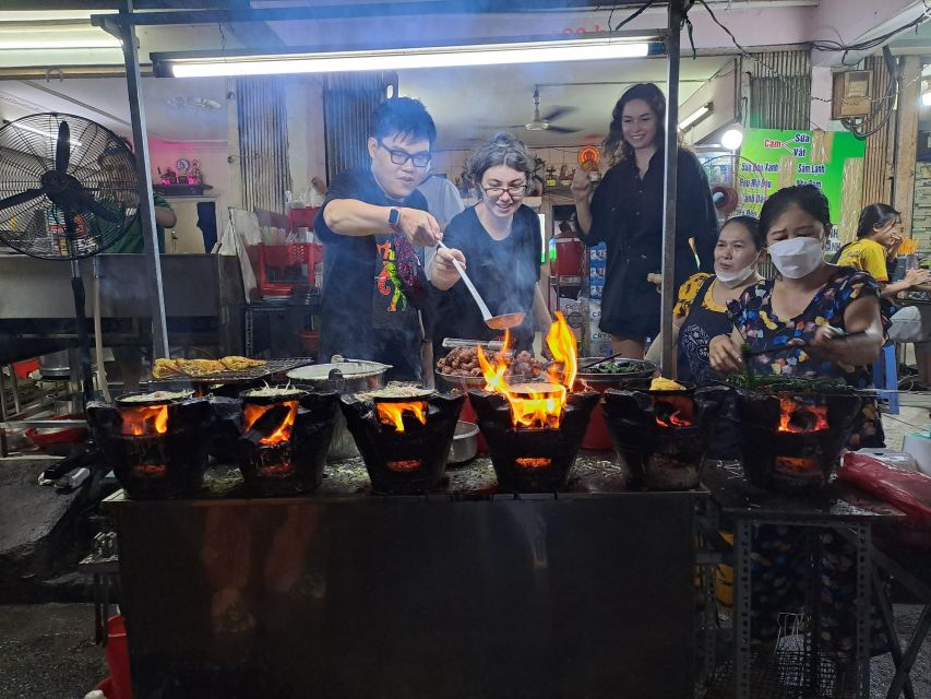 Ho Chi Minh City: Food Tour by Scooter with Eleven Tastings - The scooter ride through Saigon traffic