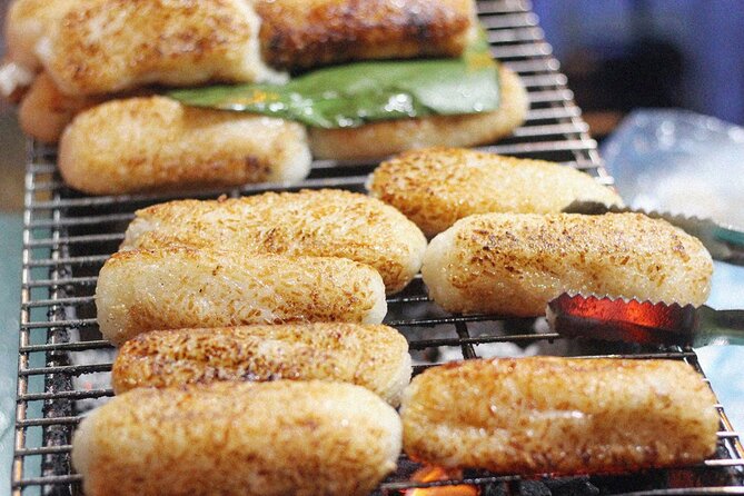 Ho Chi Minh City Street Food Tour & Sightseeing By Motorbike - Cambodian Market and crunchy snacks
