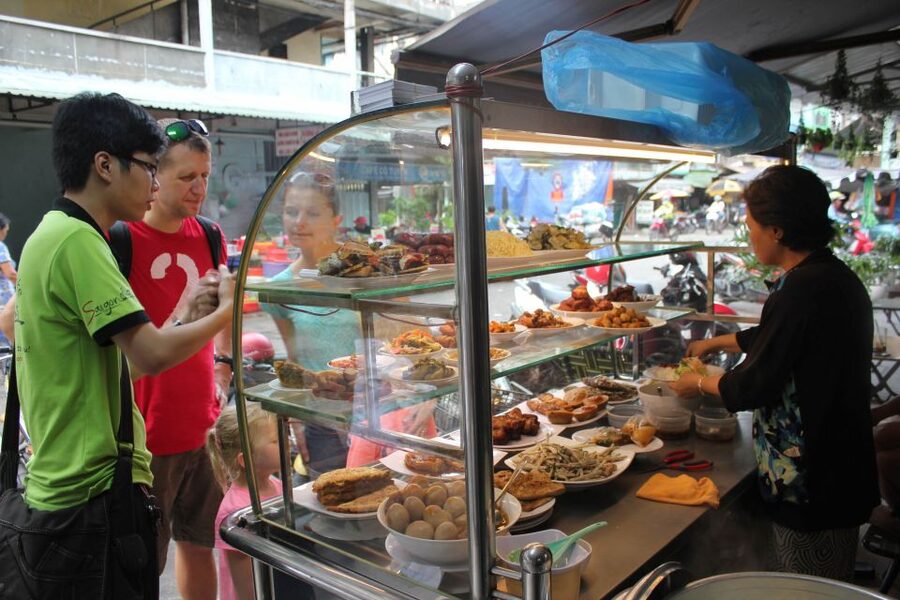 Ho Chi Minh City: Street Food Walking Tour with 12 Tastings - Pickup, walking, group size, and practical limits