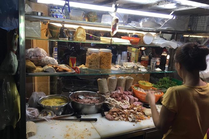 Ho Chi Minh City: Street Food Walking Tour with 12 Tastings - Alleys and Local Food Spots by Scooter