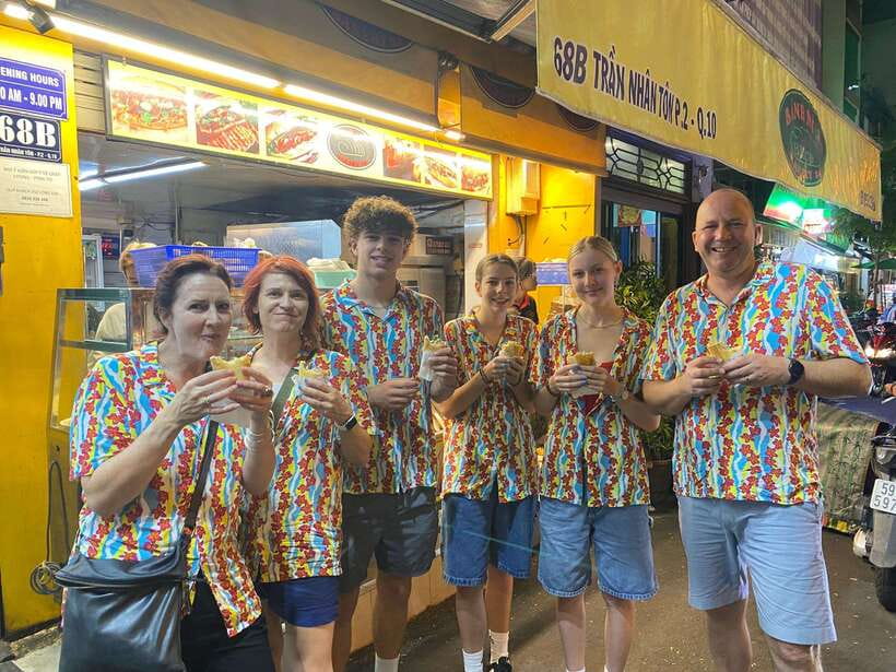 Ho Chi Minh City: Walking Food Tour with 13 Tastings - First bites: bánh xèo and grilled beef in betel leaf