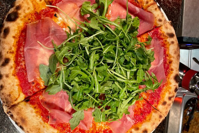 Kelowna: #1 Rated Walking Food Tour with 7 Tastings and 4 Drinks - Curious Cafe brings wood-fired pizza