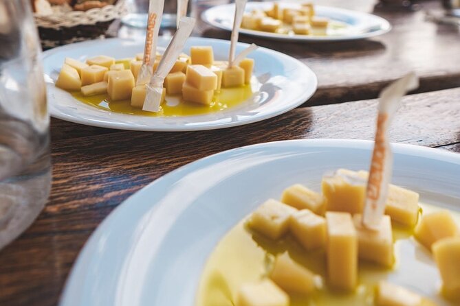Krka Waterfalls, Food & Wine Tasting, Boat Ride & Zadar Old Town - Sladic Winery: four wines, cheese, and olive oil