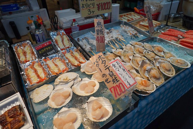 Kuromon Market Food Walking Tour in Osaka (6 stops, 6 tastes) - Kuromon Market, Osaka’s main food stage