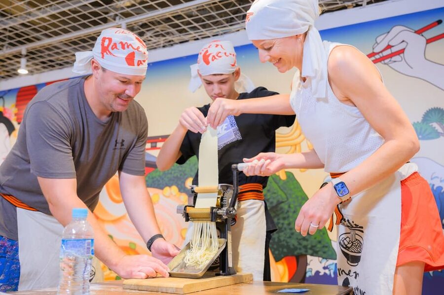 Kyoto: Ramen Cooking Class at a Ramen Factory with Souvenir - Seasoning chicken and building the ramen base