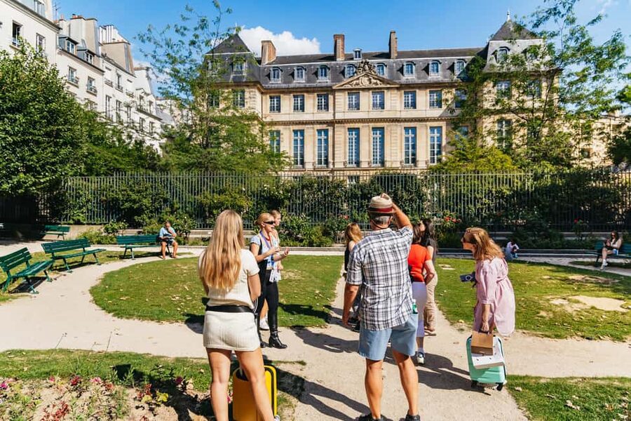 Le Marais Walking Food Tour with Cheese, Wine & Pastries - The market stop and local shops