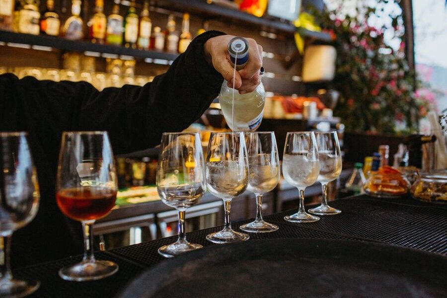 Lisbon: Evening Food & Wine Tour in Bairro Alto - Fire-roasted chouriço at Grapes & Bites