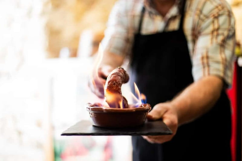 Lisbon: Food Tasting Tour by Tuk Tuk with 2 Stops - The first tasting: a small lesson in Portuguese eating