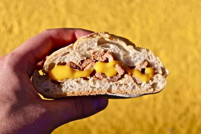 Lisbon Food Tour with 10+ Tastings of Local Delicacies & Wines - Santa Justa Lift and the climb from Baixa