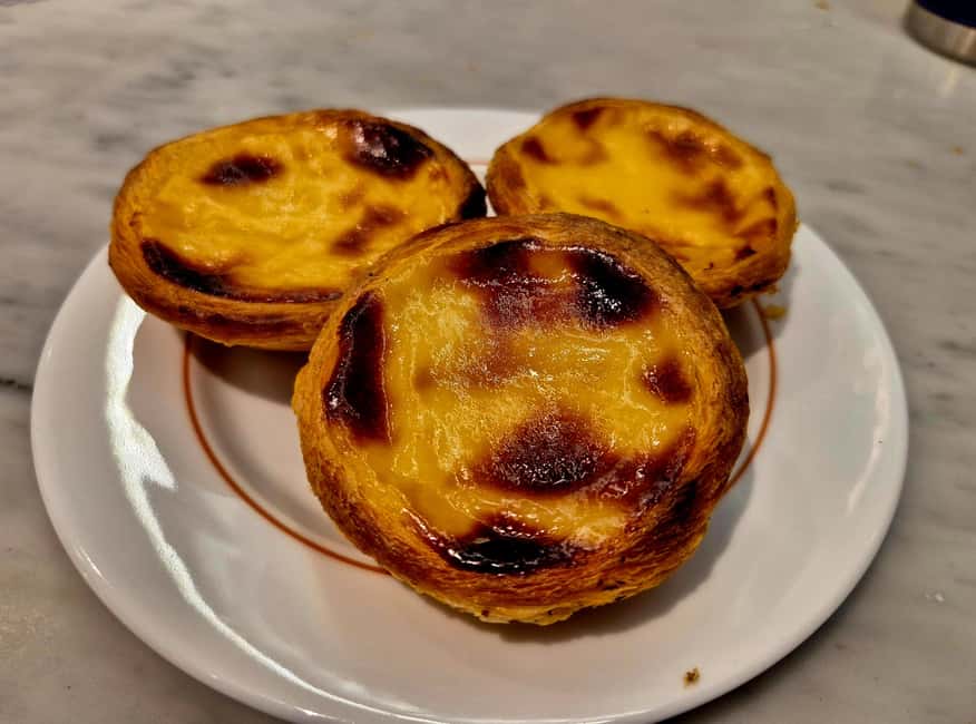 Lisbon Small-Group Food & Wine Tour Eat & Drink like a Local - Bacalhau à Brás, a Portuguese comfort classic