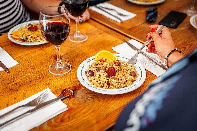 Lisbon Small-Group Portuguese Food and Wine Tour - The final rice dish and wine pairing