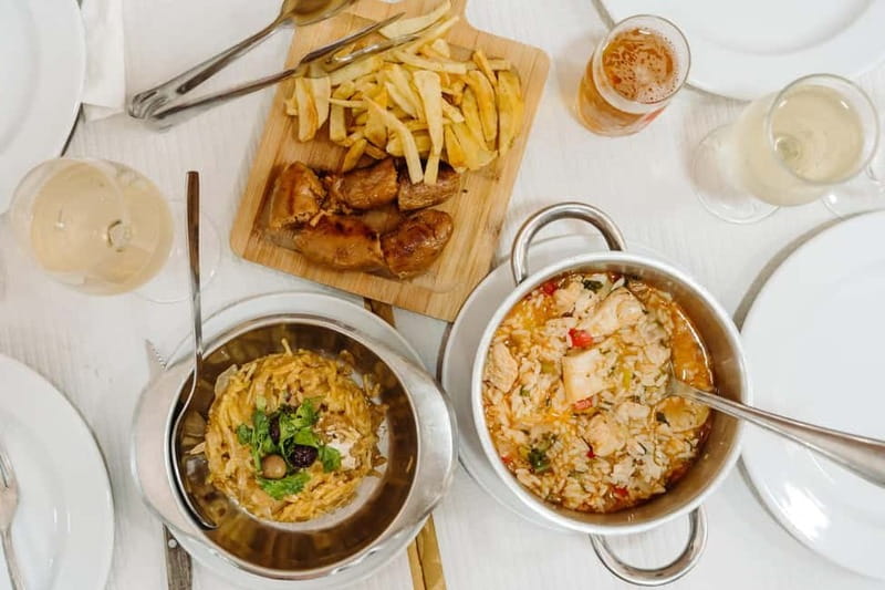 Lisbon: Tastes and Traditions Guided Food Tour - Confeitaria Nacional adds pastries and old Lisbon atmosphere