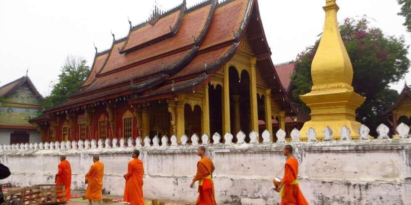 Luang Prabang: Foodie Walking Tour & Monk Blessing - Luang Prabang’s old town between bites