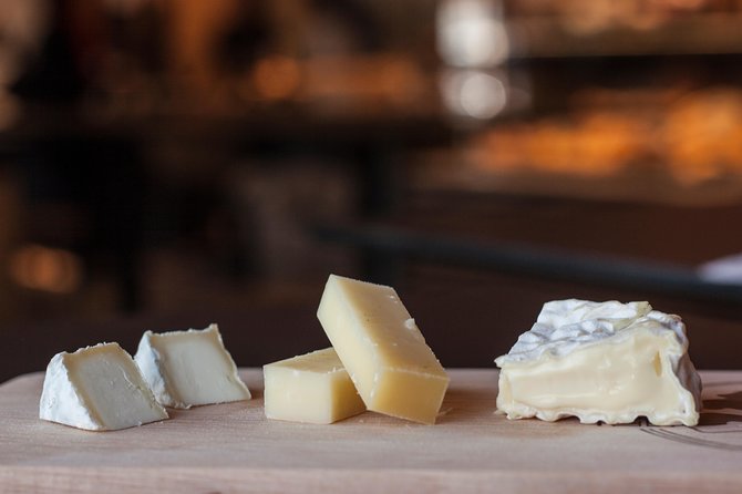Lyon Old Town Food Tour with 6 French Delicacies & Fine Wine - Chez Mamie: charcuterie, cheese, and a pot lyonnais