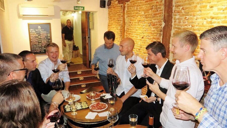 Madrid: Iberico Ham and Spanish Wine Small-Group Food Tour - Visiting traditional jamonerías in Madrid
