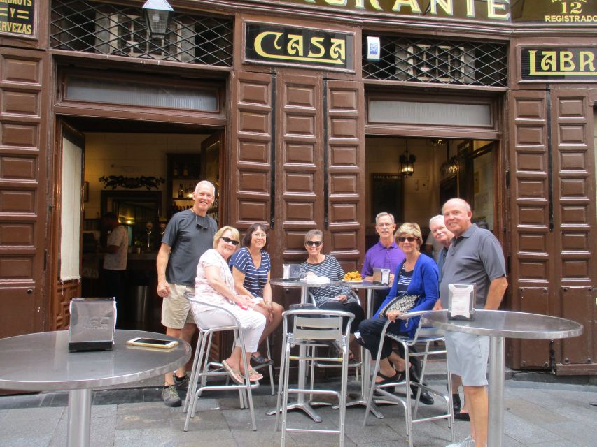 Madrid: Old Madrid Walking Food and Wine Tour - Walking Past Madrid’s Essential Landmarks