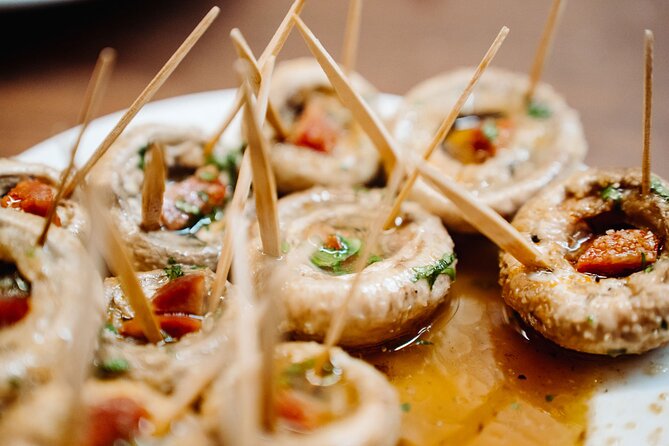 Madrid Tapas & Taverns Small Group Food & History Tour - Four taverns, nine tapas, and one useful walking lesson