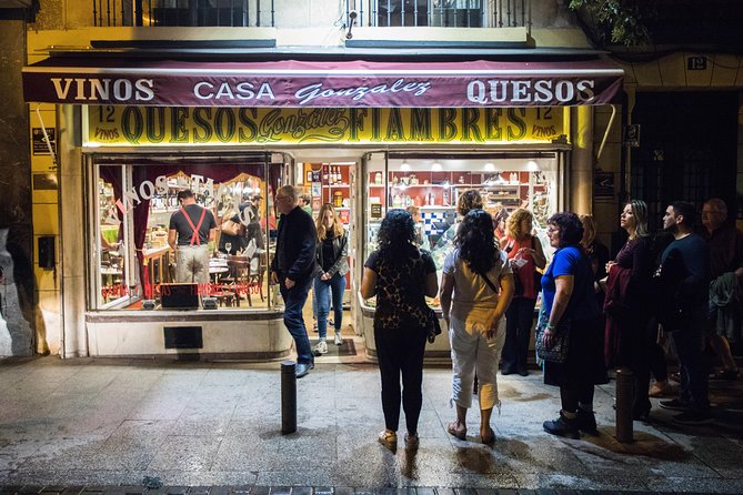 Madrid Tapas & Wine Tasting Walking Tour – Small Group Local Bars - Stop four: a century-old, dark Madrid tavern