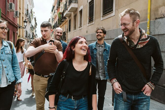 Madrid Ultimate Spanish Cuisine Food Tour - Moega: bread, empanadas, and a chorizo-filled roll
