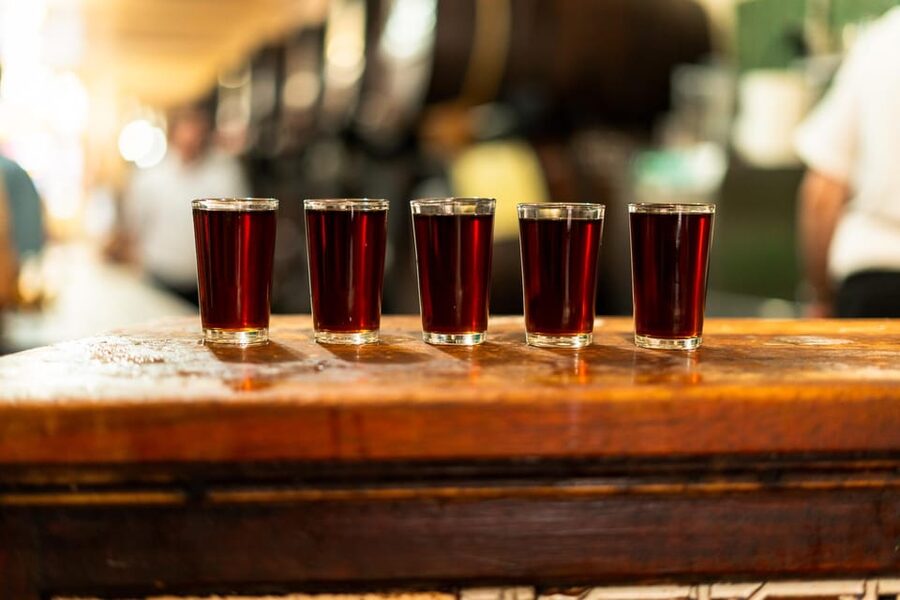 Malaga: Wine and Tapas Tour with Tastings and Drinks - The short walk between venues adds useful context