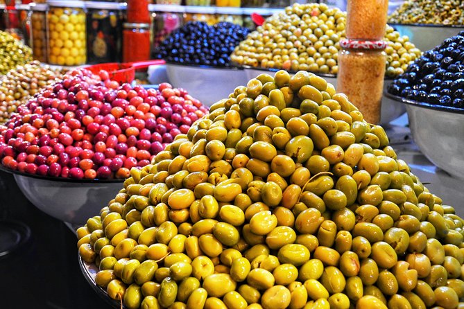 Marrakech: Street Food Tour by Night - Koutoubia Mosque and the changing face of Marrakech