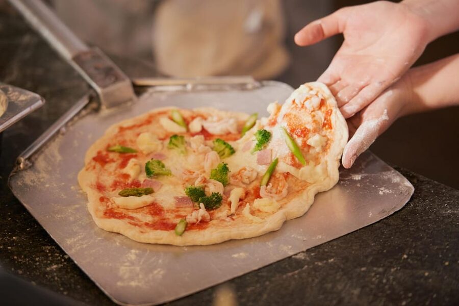 Master Authentic Neapolitan Pizza & Tiramisu at Home - Eating the pizza you made