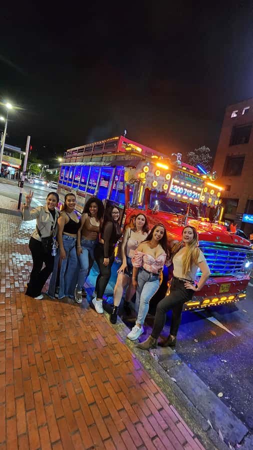 Medellin: Party Bus with DJ & Street Food Tastings - Starting at Punto de Encuentro in El Poblado