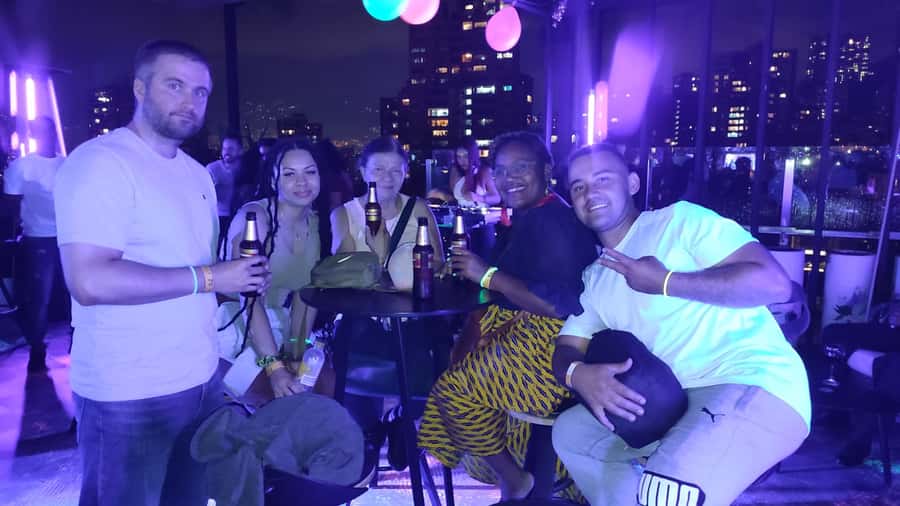 Medellin: Street Food and Poblado Rooftop Tour with a Local - Five food stops, with arepas at the center