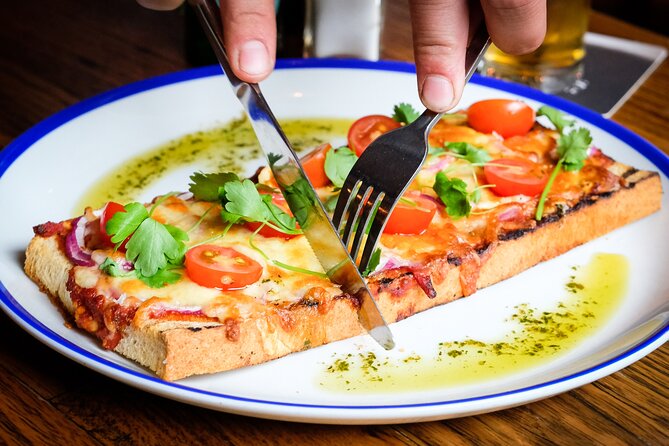 Melbourne Food Tour with 8+ Food Tastings in Hidden Laneways - Start beneath the clocks at Flinders Street Station