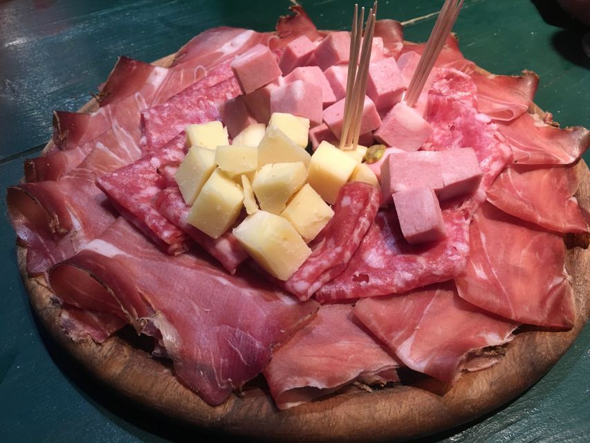 Milan’s Full-Meal Gourmet Food Tour - More Than Tastings - Piazza Paolo VI, wine, and a serious antipasto board