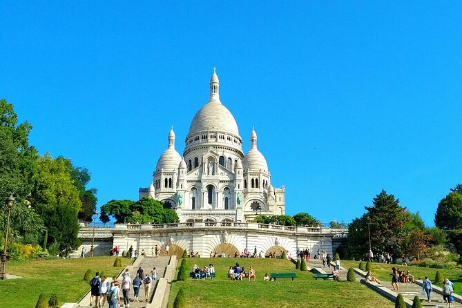 Montmartre Hill French Gourmet Food and Wine Tasting Walking Tour - Eight stops, with sweets taking the lead