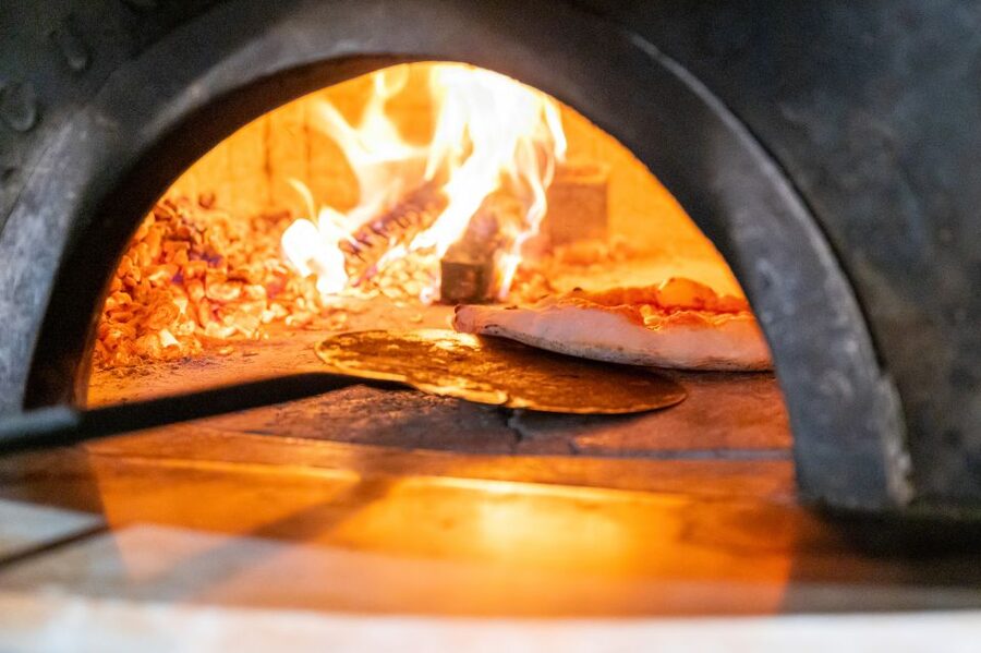 Naples: Authentic Neapolitan Pizza Making Class - Putting on an apron and learning from the pizzaiolo