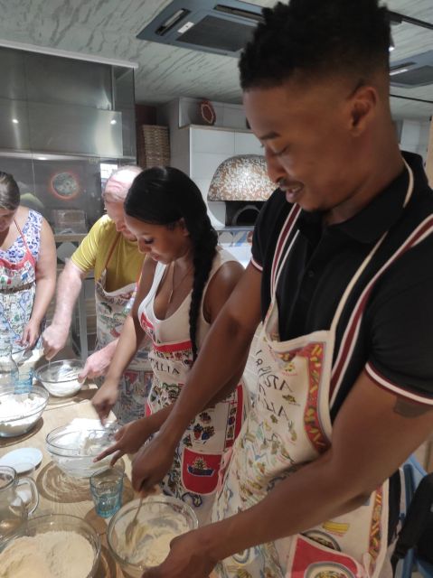 Naples: Small Group Pizza Making with Drink Included - Choosing toppings and building your pizza
