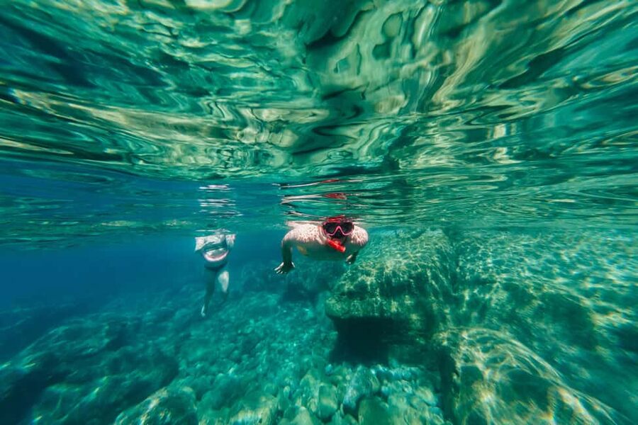 Naxos/ Paros: Sailing Cruise with Food and Drinks - Swimming and snorkeling at three coastal stops
