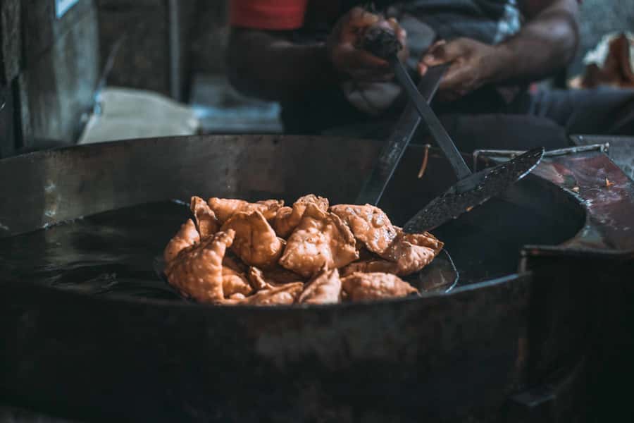 Old Delhi: 3-hour Street Food Tour - Jalebi and samosa at a century-old shop