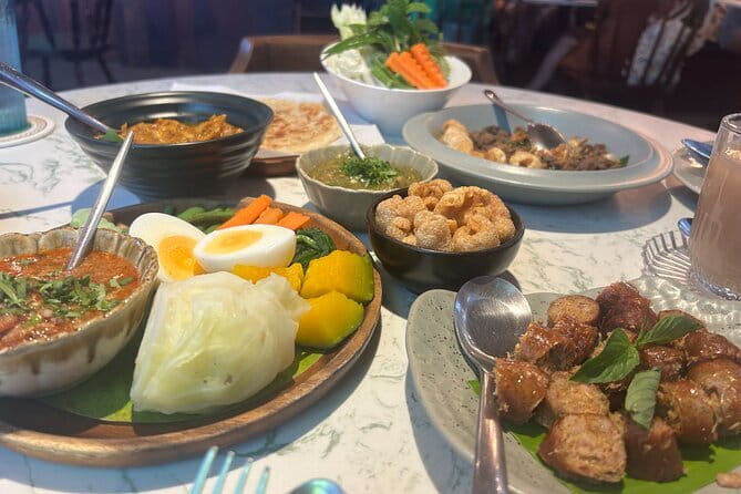 Old Town Chiang Mai Food Tour with 10+ Local Dishes Tastings - A meal with a social purpose at the massage center