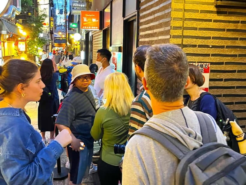 Osaka: 2-Hour Local Street Food Tour – Dotonbori & Namba - Starting beneath the Glico Man sign