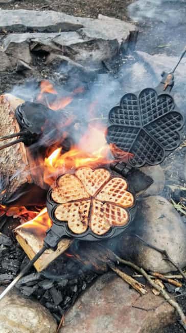 Oslo’s Secret Forest Gastronomy: Private Chef & Local Feast - Making a rømme waffle over the flames