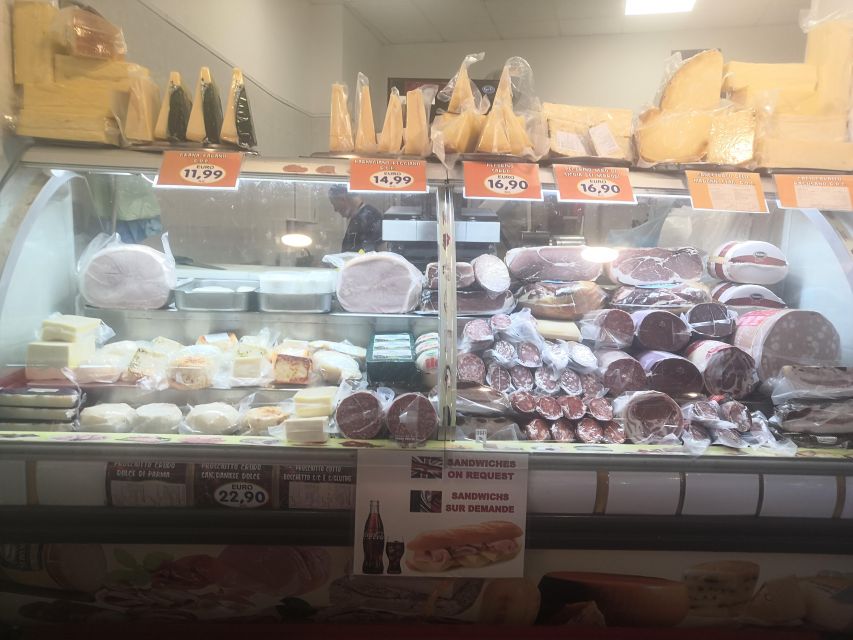 Palermo: Street Food Walking Tour at Sunset - Trying arancine and the famous spleen sandwich