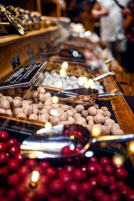 Paris: Montmartre Food Tour with 10 Local Tastings & Wines - The butcher, cured meats, and the savory side of France