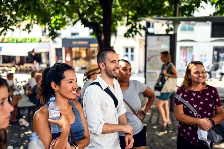 Paris: Montmartre Food Tour with 10 Local Tastings & Wines - Montmartre food shopping beyond the postcards