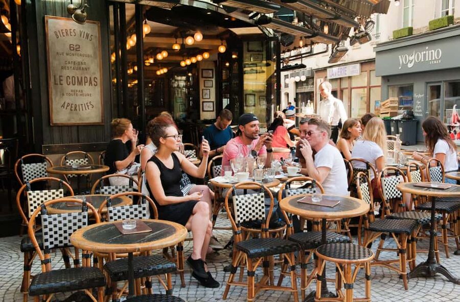 Paris: Montmartre Food Tour with Full Meal - Cheese, crêpes, macarons, and chou
