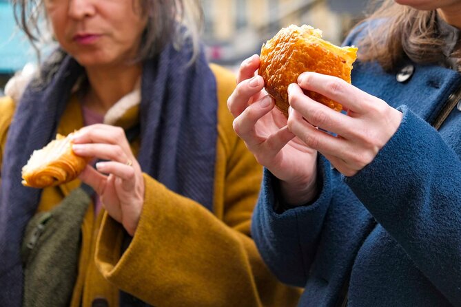 Paris Montmartre Food & Wine Tour with Eating Europe - Starting on Rue Lepic with bread and chocolate