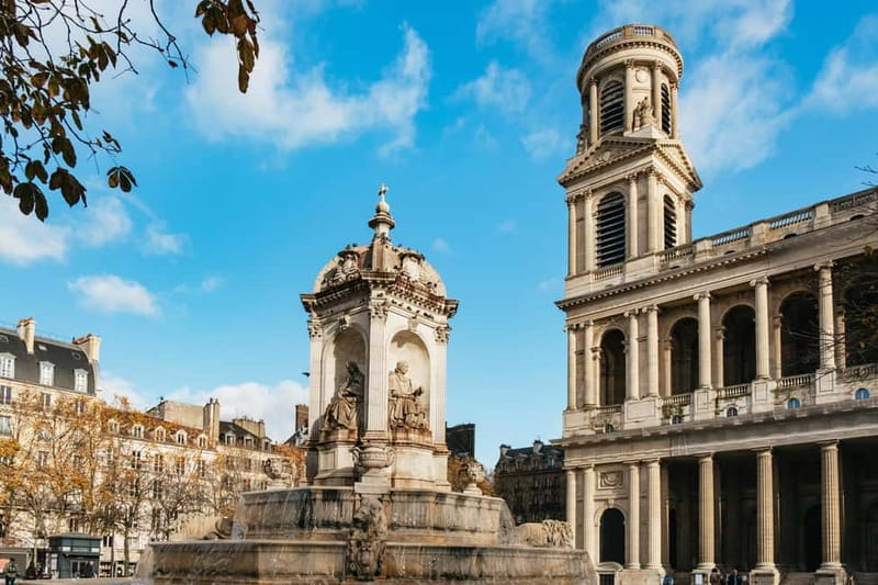 Paris: Saint Germain des Prés Guided Foodie Walking Tour - Savory food, wine, and the cellar stop