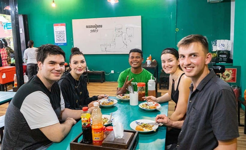 Phnom Penh: Evening Food Tour with Drinks & Tuk Tuk Included - The riverfront is your first taste of Phnom Penh at night